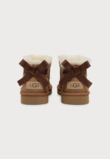 Stivali Donna UGG Classic Ultra Mini Bailey Bow Chestnut in Camoscio – Stivaletti Bassi Senza Tacco con Fiocco Posteriore