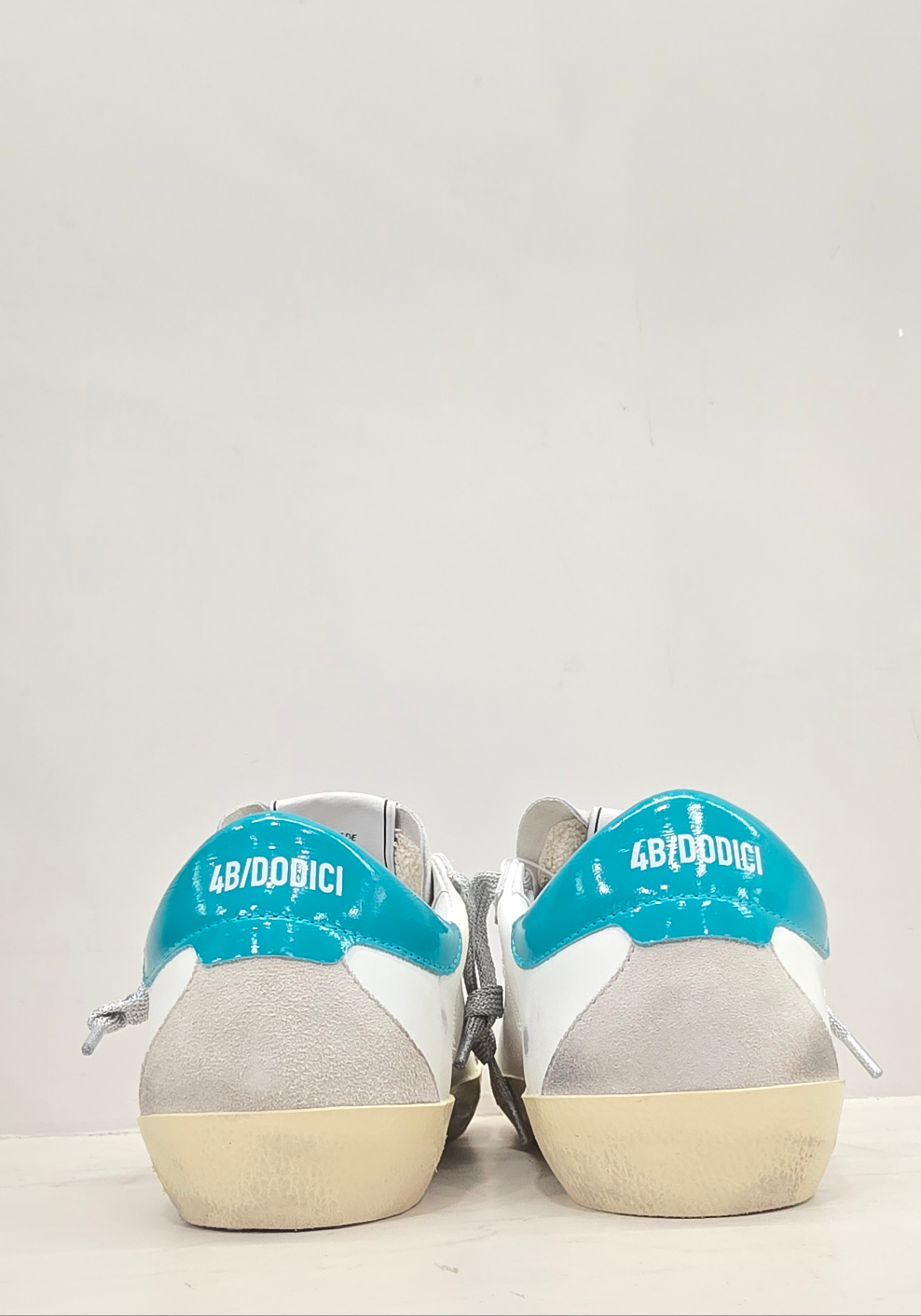 Sneaker Suprime bianco-turchese 4B12