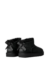 Stivali Donna UGG Classic Ultra Mini Bailey Bow Nero in Camoscio – Stivaletti Bassi con Fiocco e Bordo in Montone