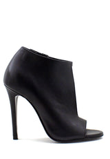Tronchetto asimmetrico nero tacco stiletto Tsakiris Mallas