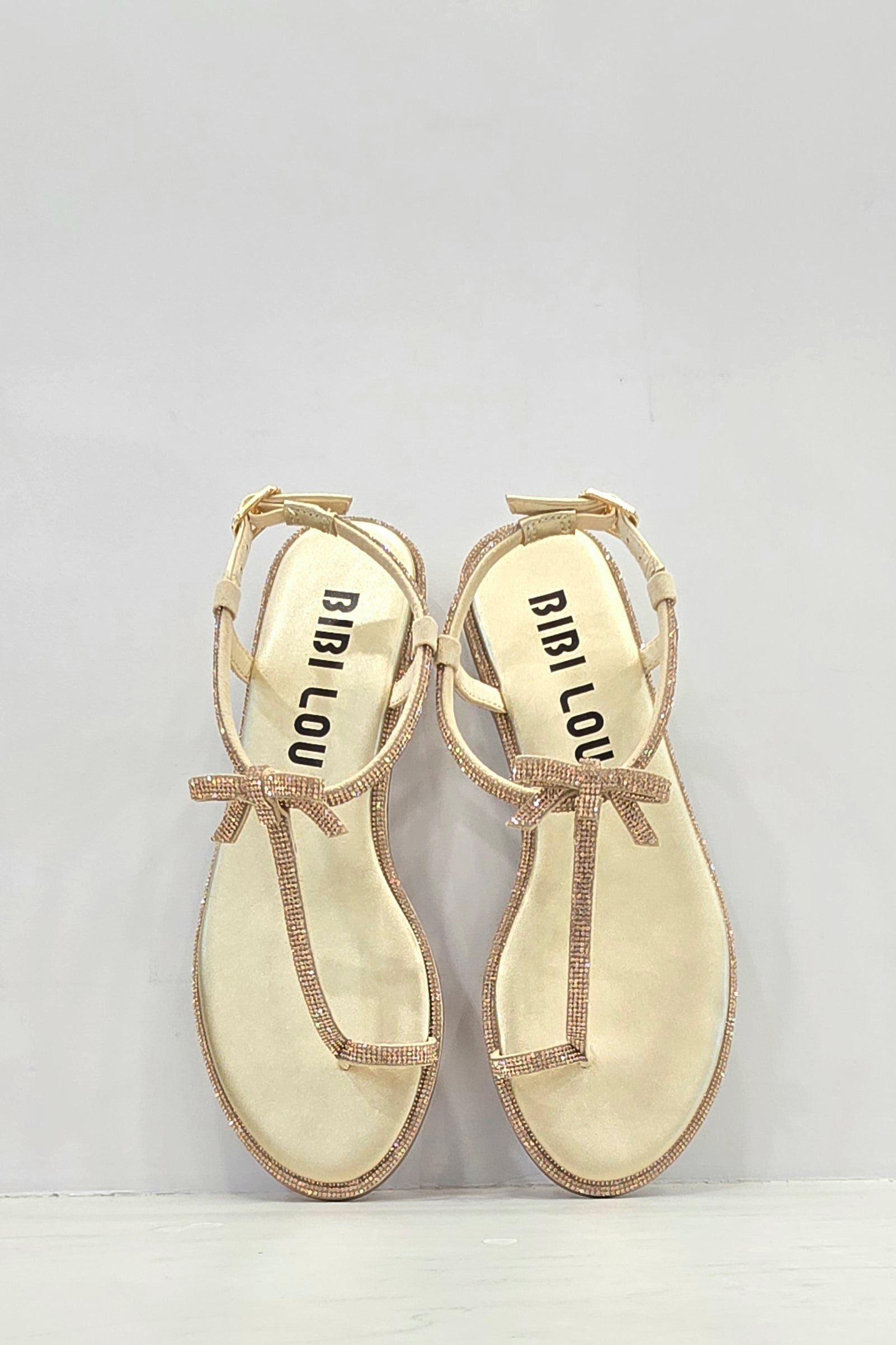 Infradito flat oro, con strass e fiocchetti Bibi Lou