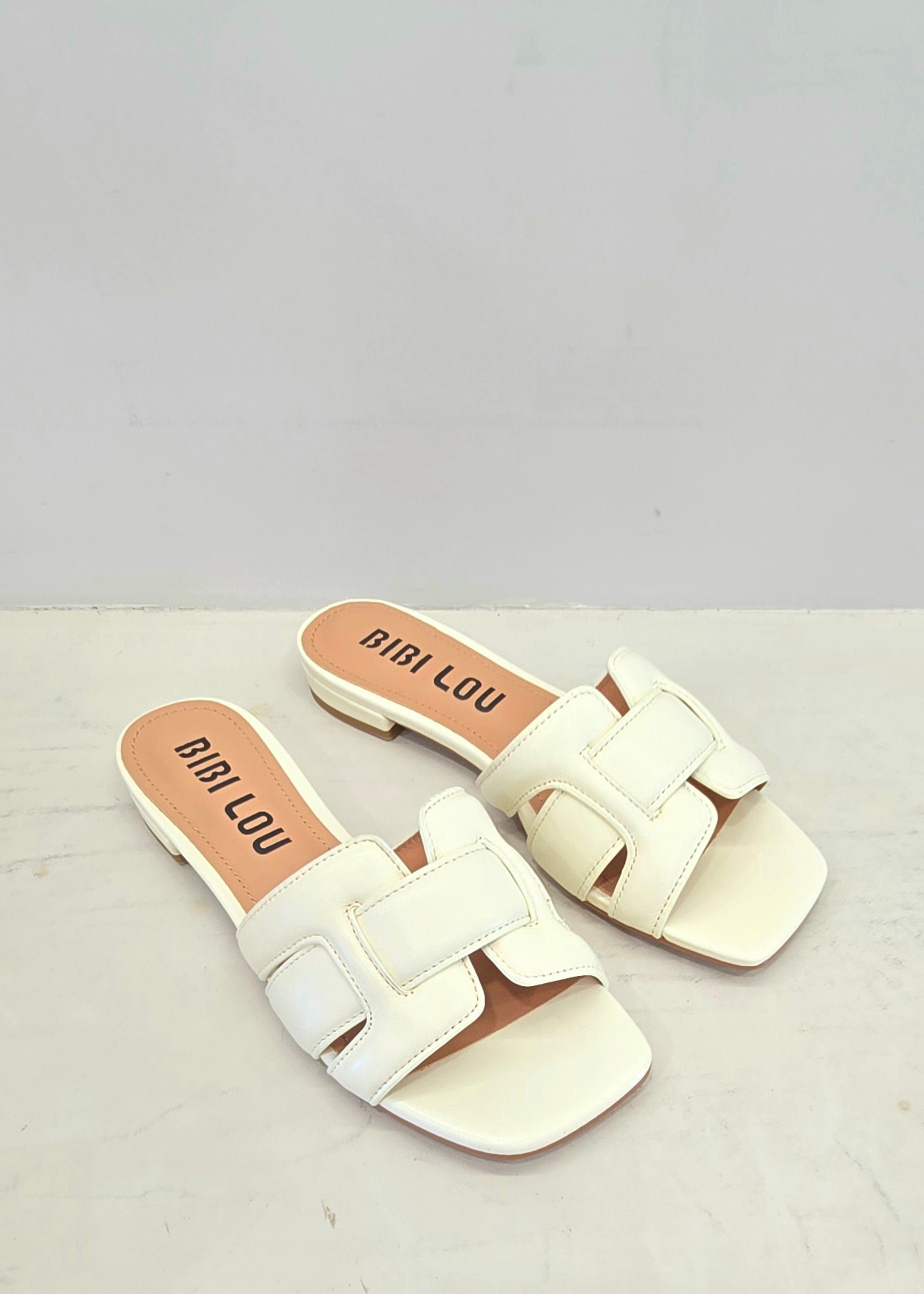 Ciabatta flat avorio fascia intrecciata Bibi Lou
