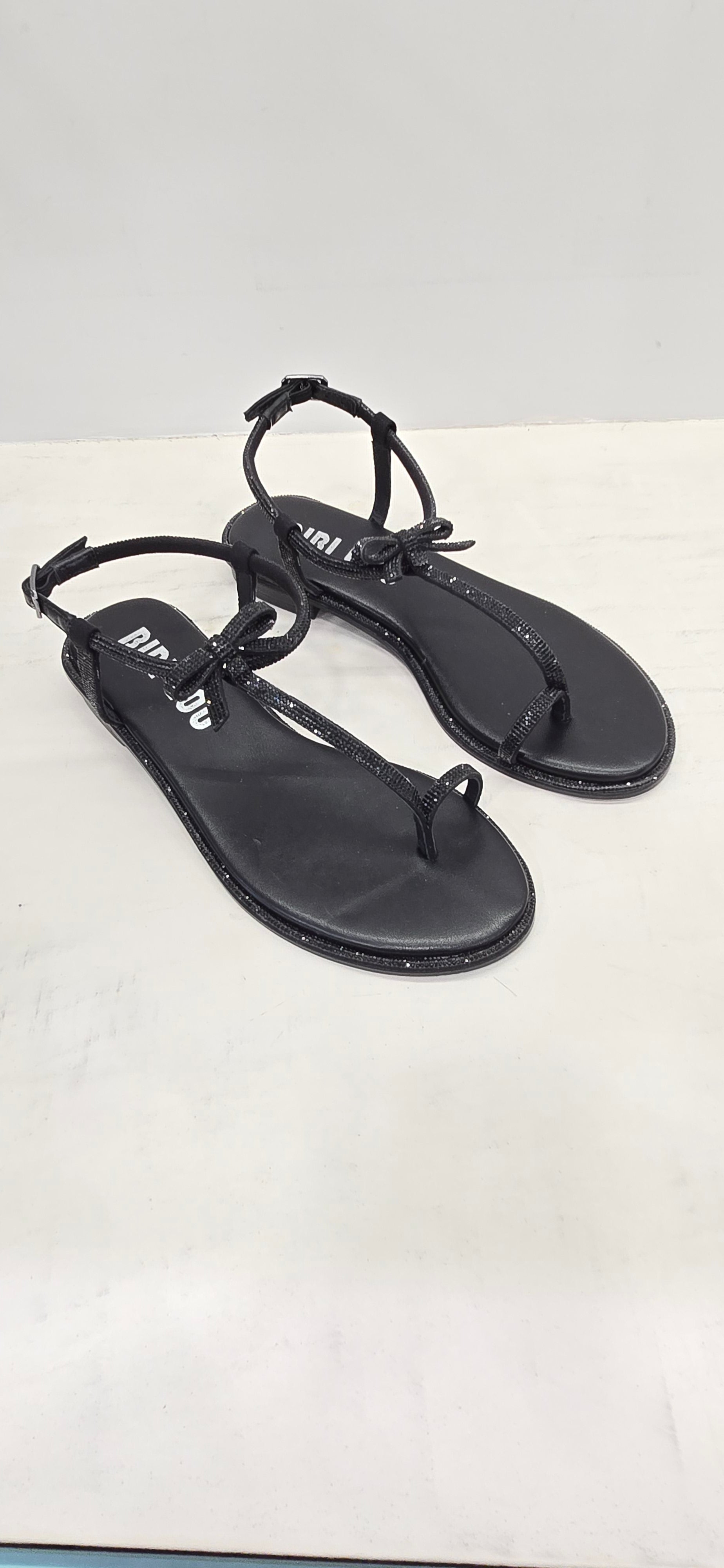 Infradito flat nero, con strass e fiocchetti Bibi Lou