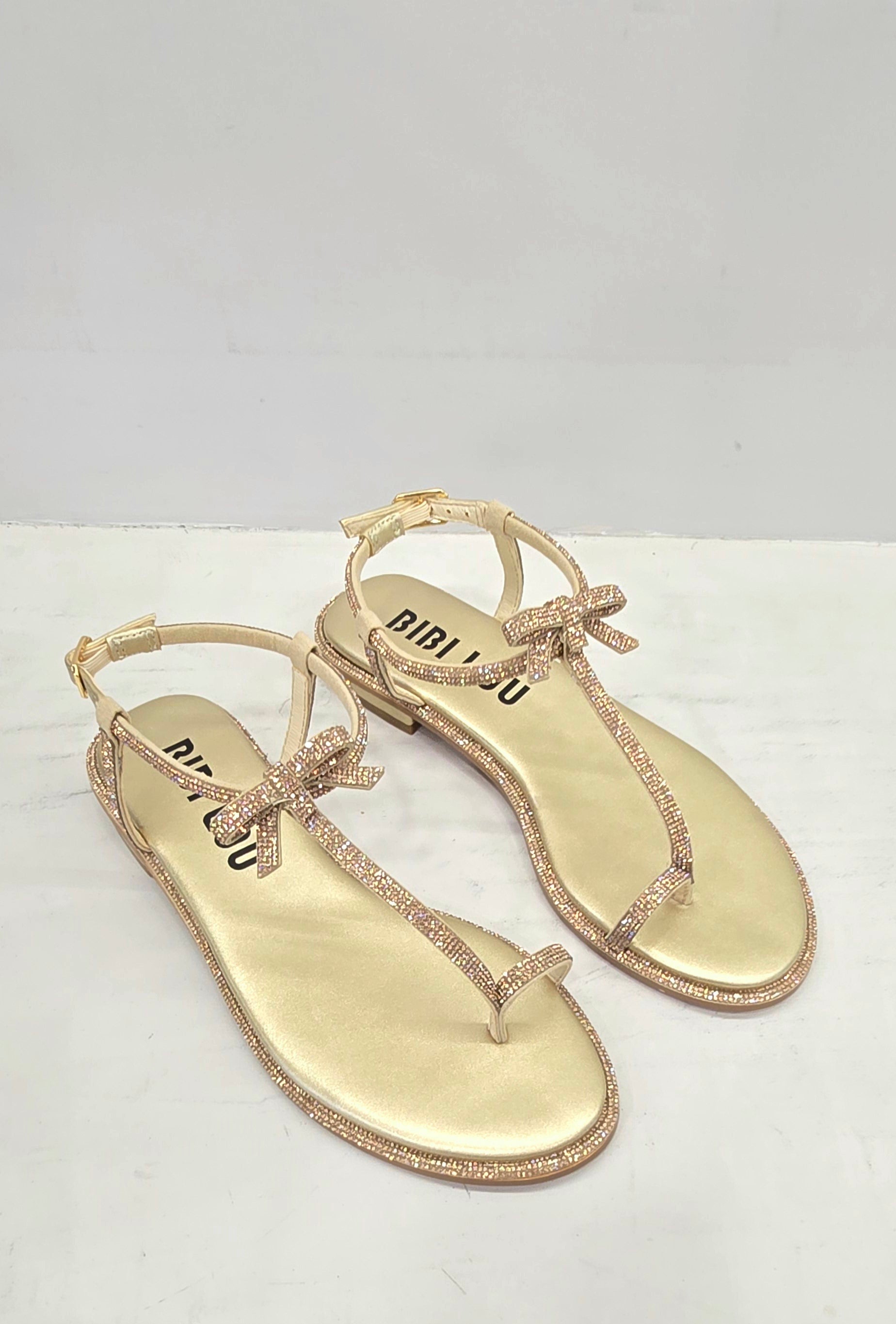 Infradito flat oro, con strass e fiocchetti Bibi Lou